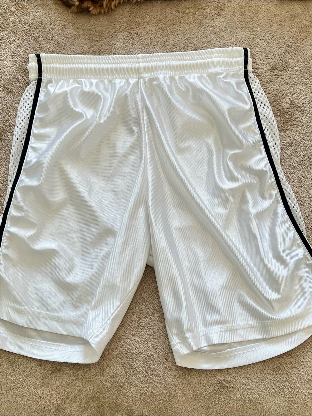 Men's White Athletic Basketball Shorts with Black Trim and Mesh Side Panels